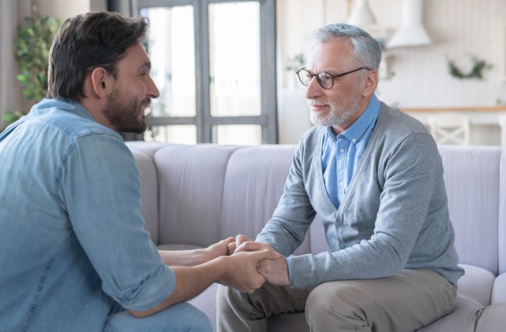 An adult child and their older adult parent discuss caregiver fatigue and how they can work together to prevent it from happening.